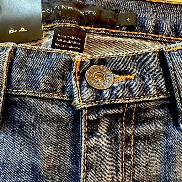 Calvin Klein Mid Rise Flared Fit Jeans in blue size 4 - Picture 7 of 9